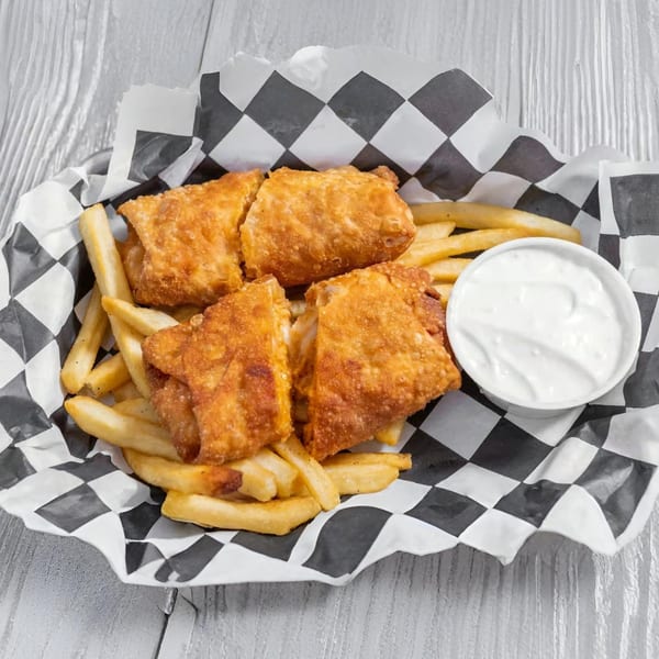Golden-fried Marc's Pizzeria and Grill appetizers with french fries and a side of white dipping sauce.